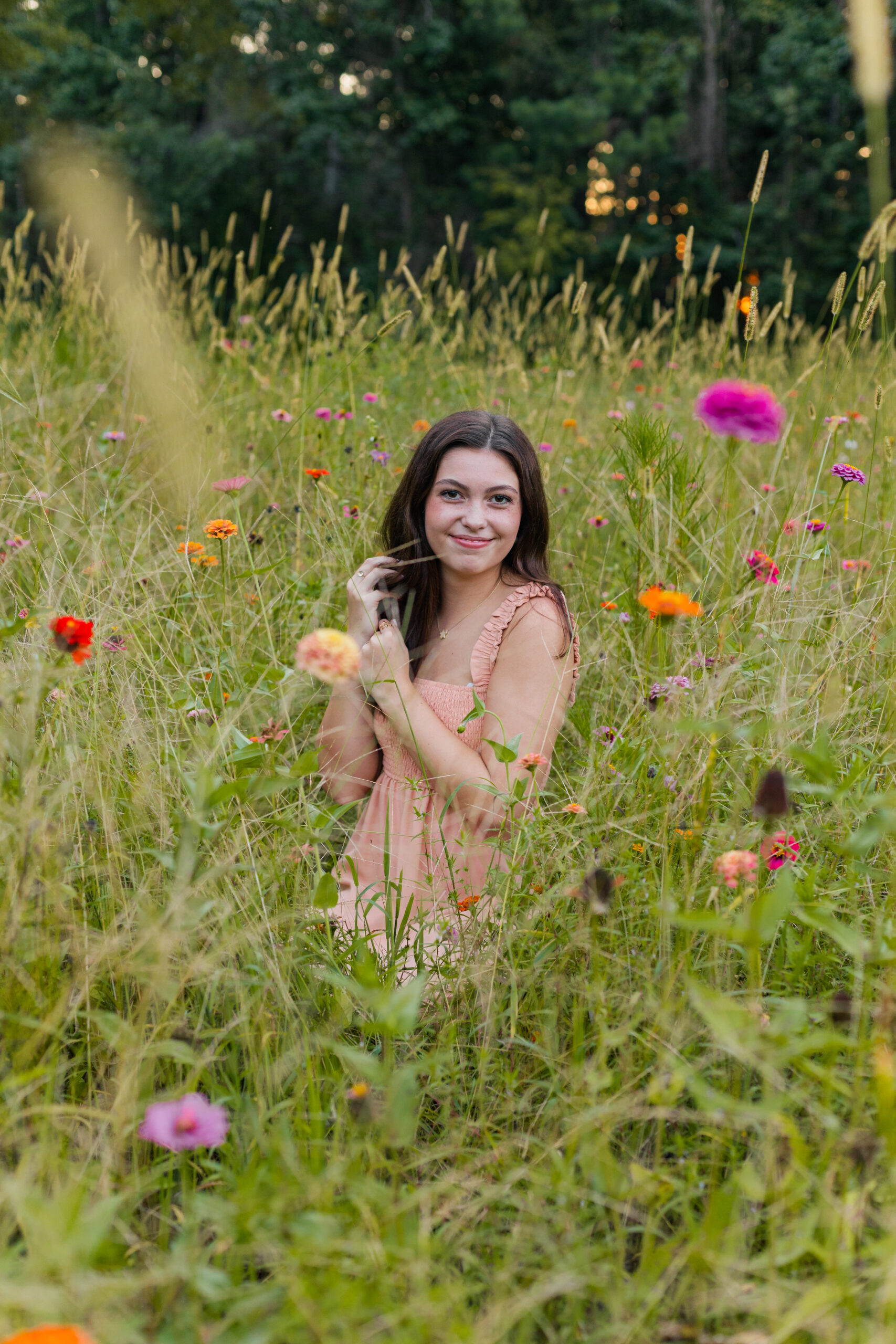 High School Senior Girl in a field of flowers for senior portraits