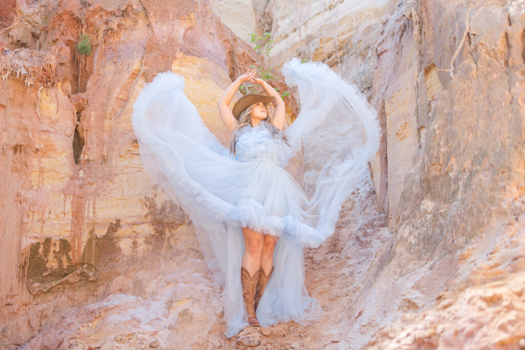 Girl's Georgia Senior Session in blue dress in canyons