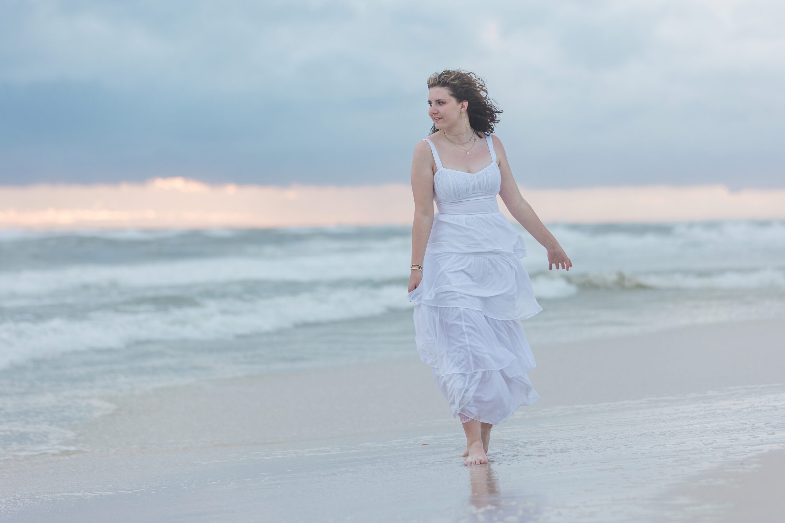 Girl walking on beach