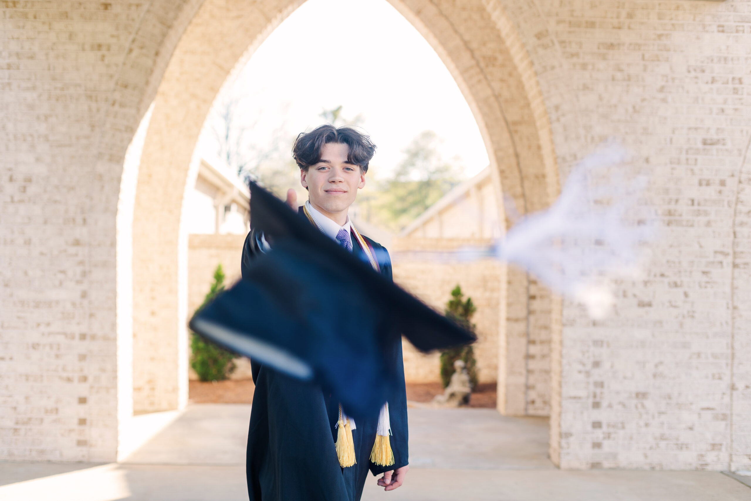 graduate tossing cap